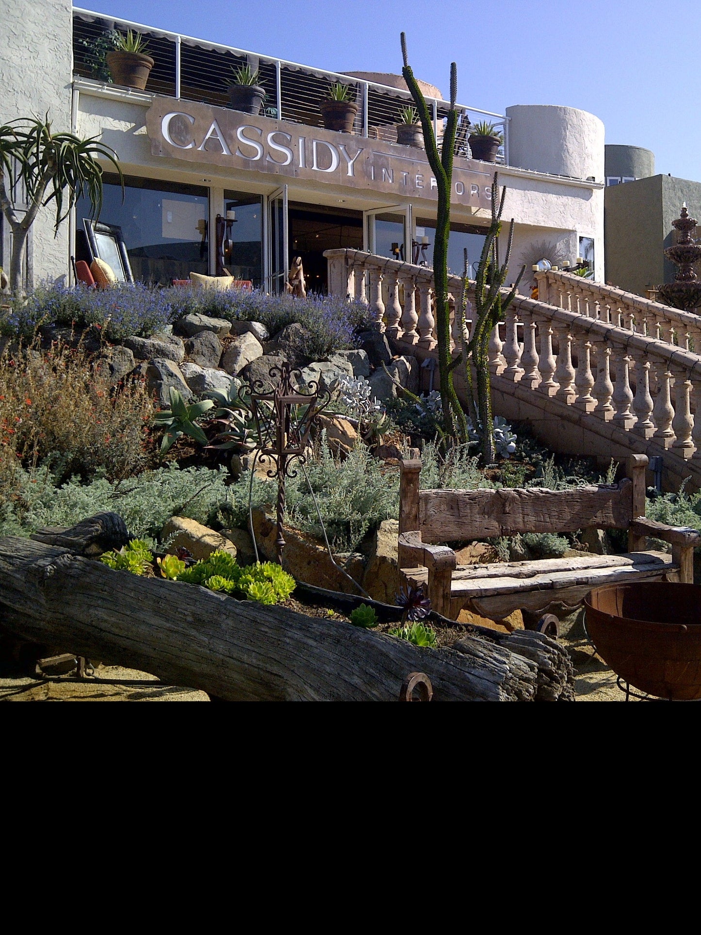 Completed cantera stone storefront railing